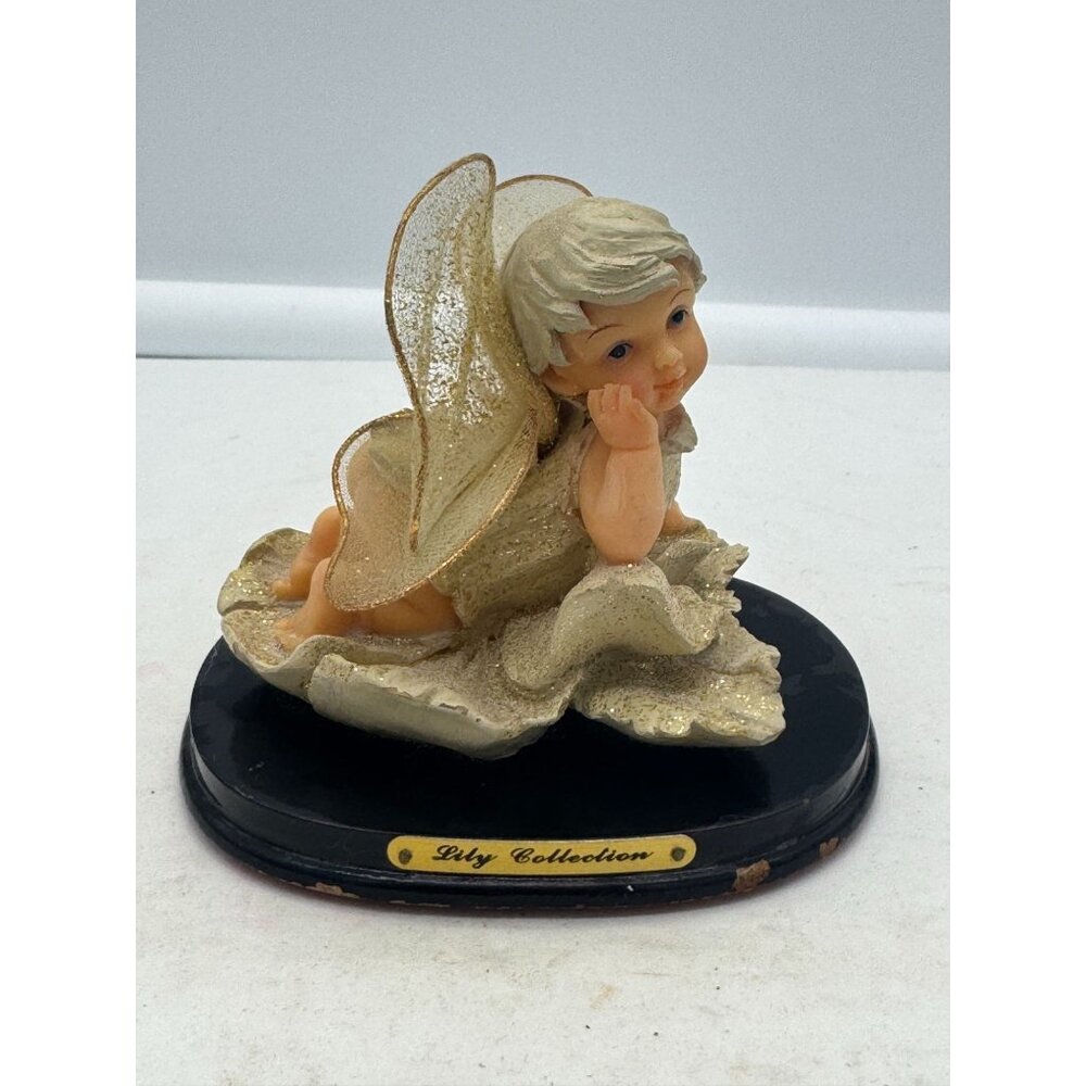 Vintage Lily Collection Fairy Baby Resting on Flower on Wood Base